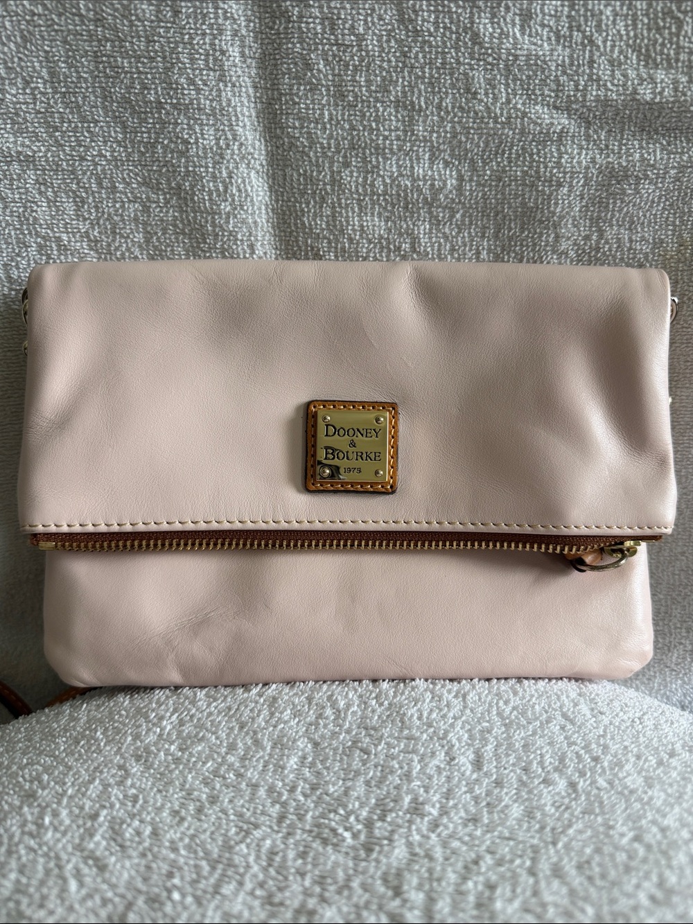 Dooney & Bourke Pale Pink Leather Foldover Clutch with Gold Plaque